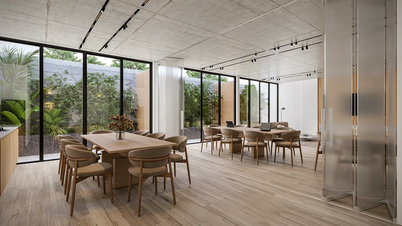 Interior de una sala de reuniones moderna con grandes ventanales y vista a un jardín.